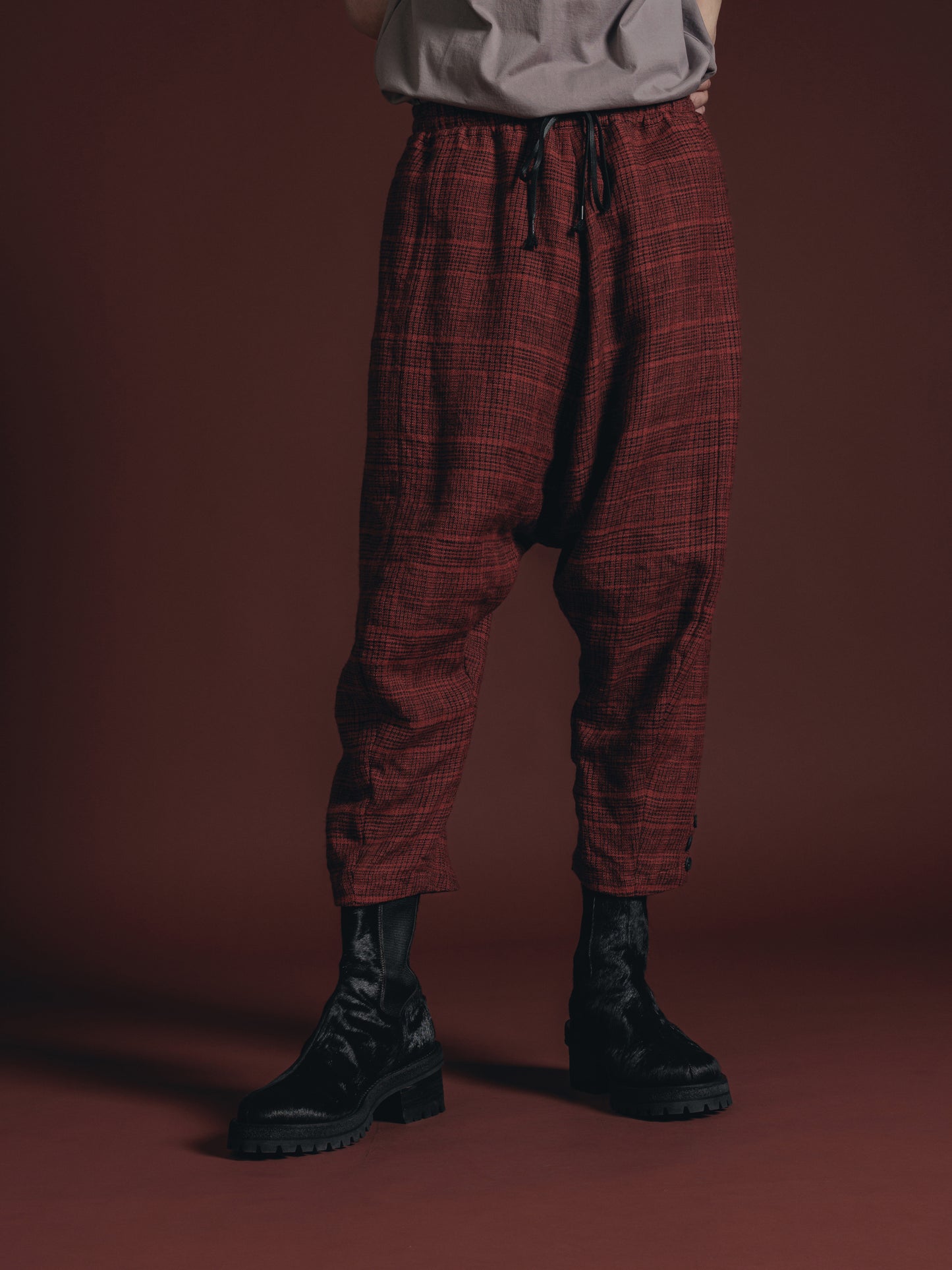 
                  
                    WOOL/LINEN RED PLAID DROP CROTCH TROUSERS
                  
                