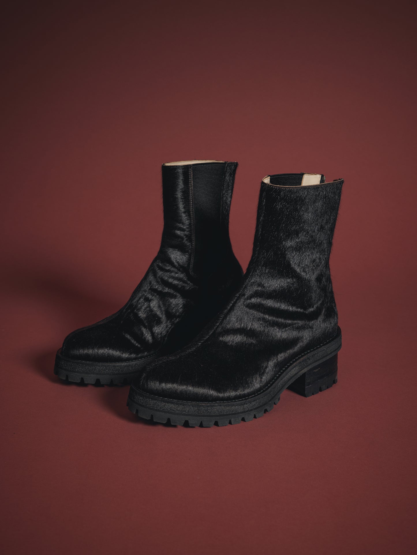 
                  
                    CALF HAIR BACK ZIP-UP BOOTS
                  
                