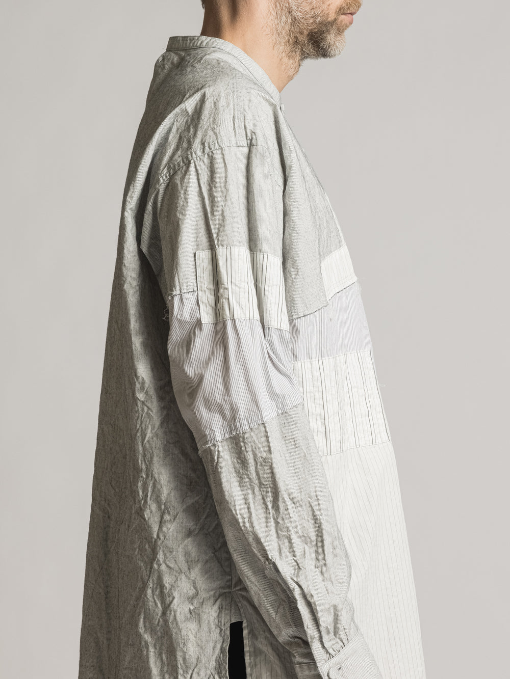 
                  
                    STRIPE COLLAGE SHIRT
                  
                