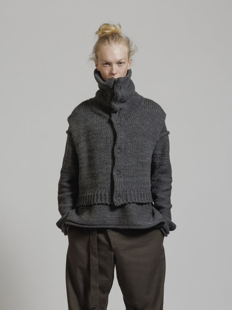 
                  
                    HIGH NECK KNIT VEST
                  
                