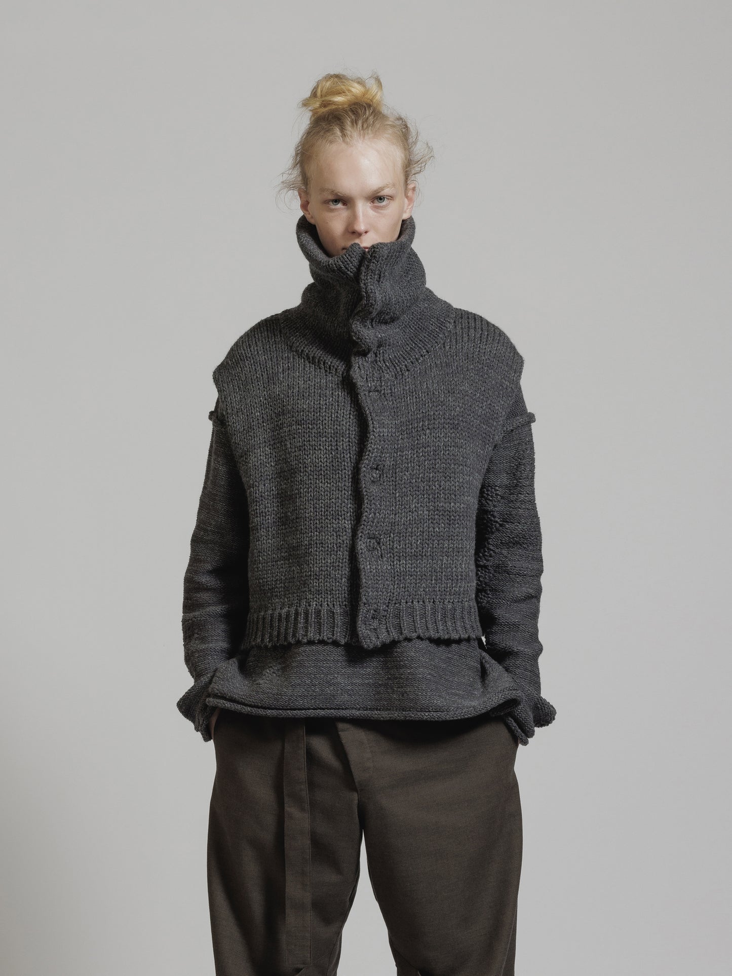 
                  
                    HIGH NECK KNIT VEST
                  
                