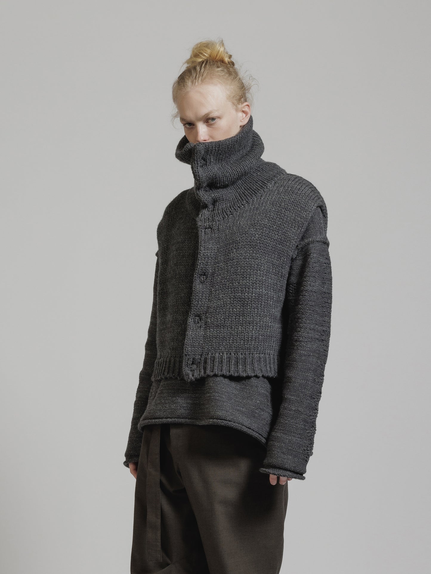
                  
                    HIGH NECK KNIT VEST
                  
                