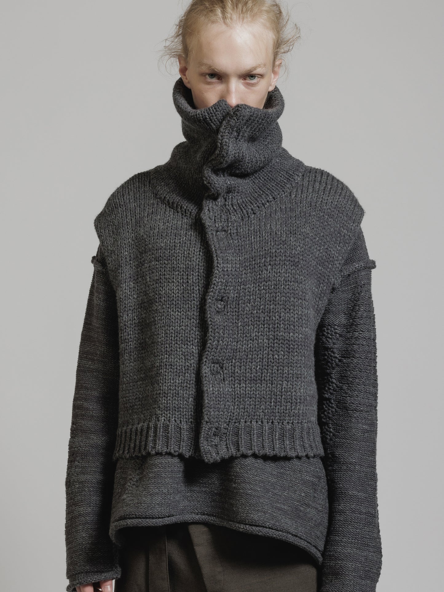 
                  
                    HIGH NECK KNIT VEST
                  
                