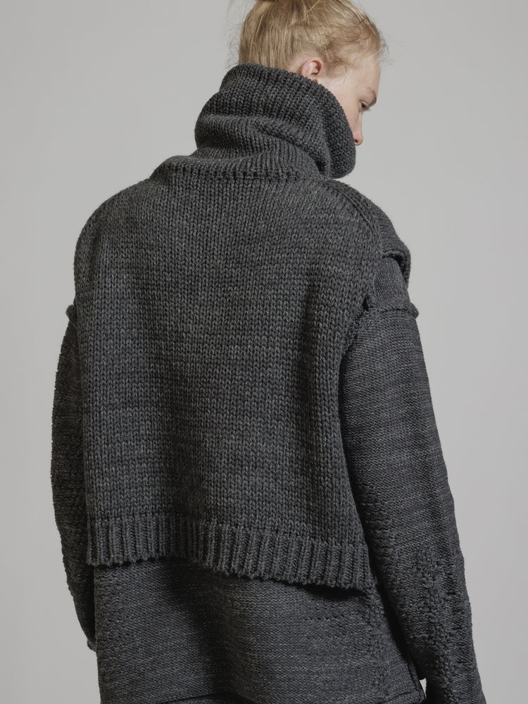 
                  
                    HIGH NECK KNIT VEST
                  
                