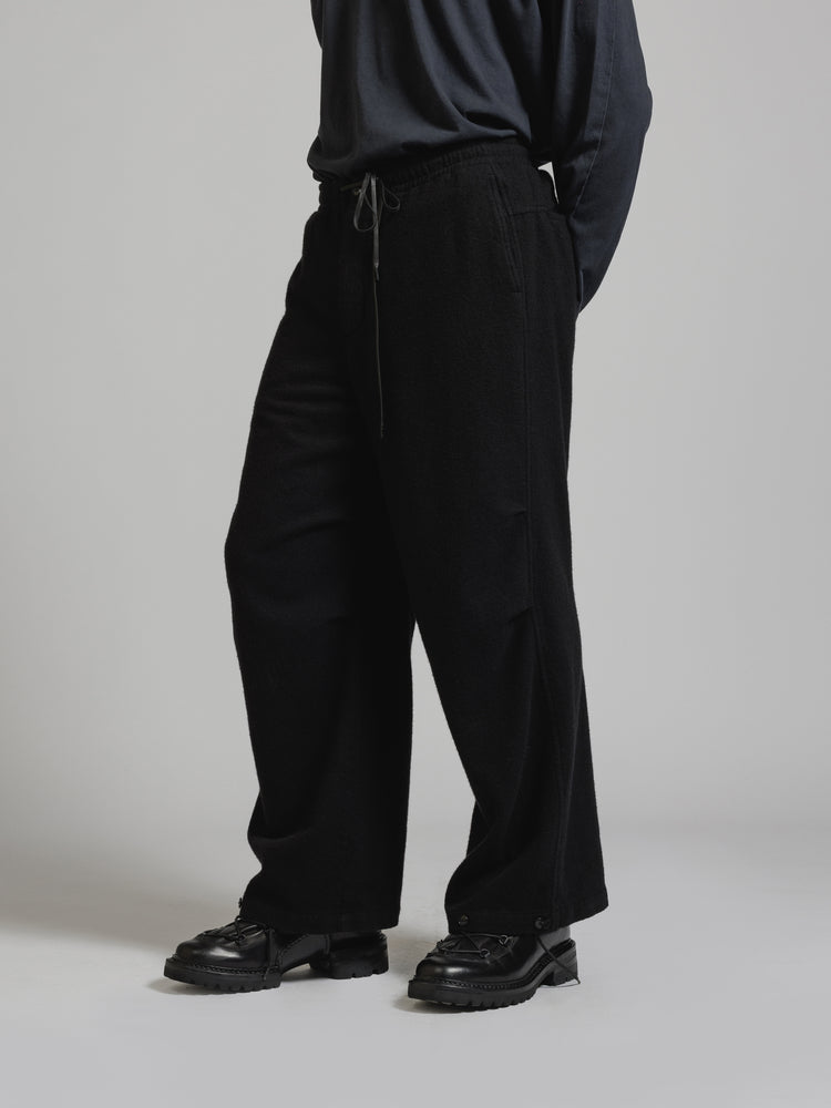 
                  
                    OBJECT DYE WOOL WIDE PANTS
                  
                