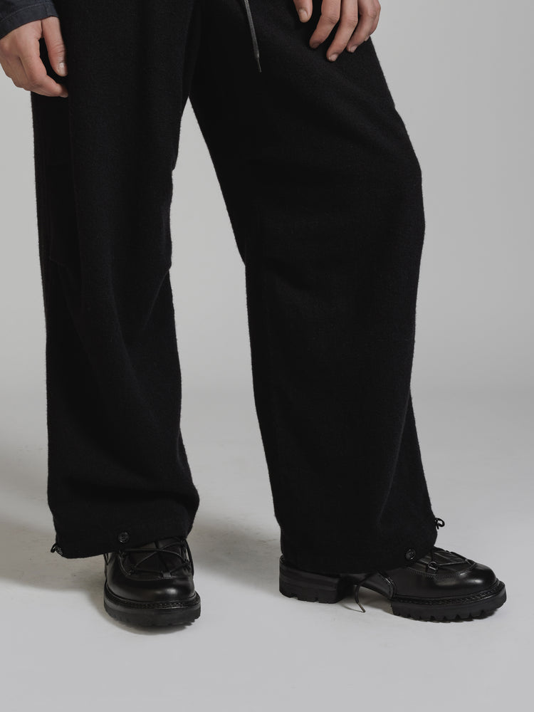
                  
                    OBJECT DYE WOOL WIDE PANTS
                  
                
