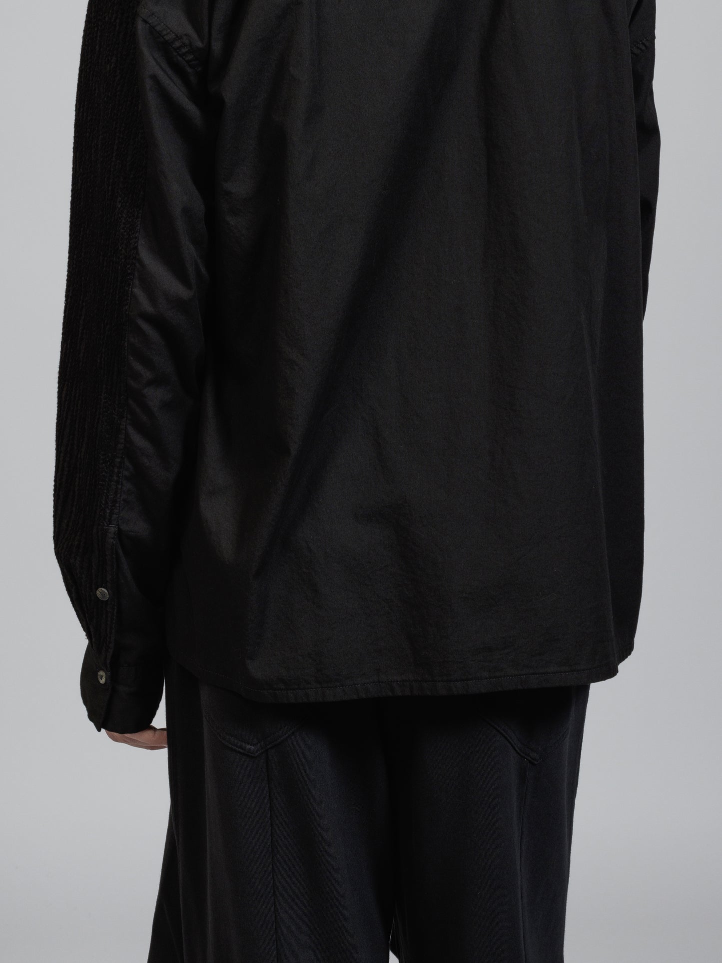 
                  
                    Embroidered cloth high-necked shirt
                  
                