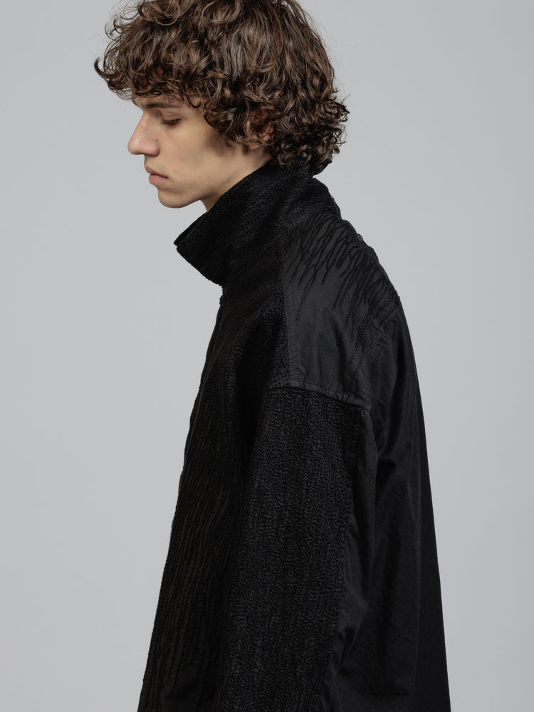 
                  
                    Embroidered cloth high-necked shirt
                  
                