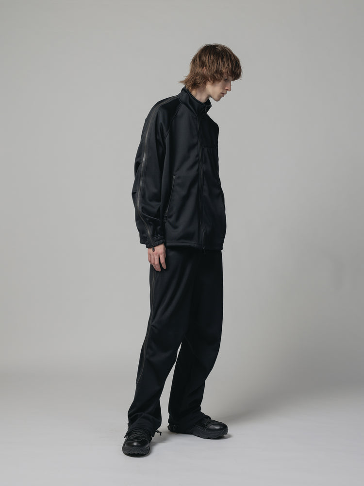 
                  
                    EXCLUSIVE TRACK PANTS
                  
                