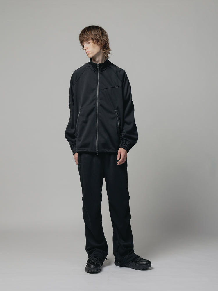 
                  
                    EXCLUSIVE TRACK PANTS
                  
                