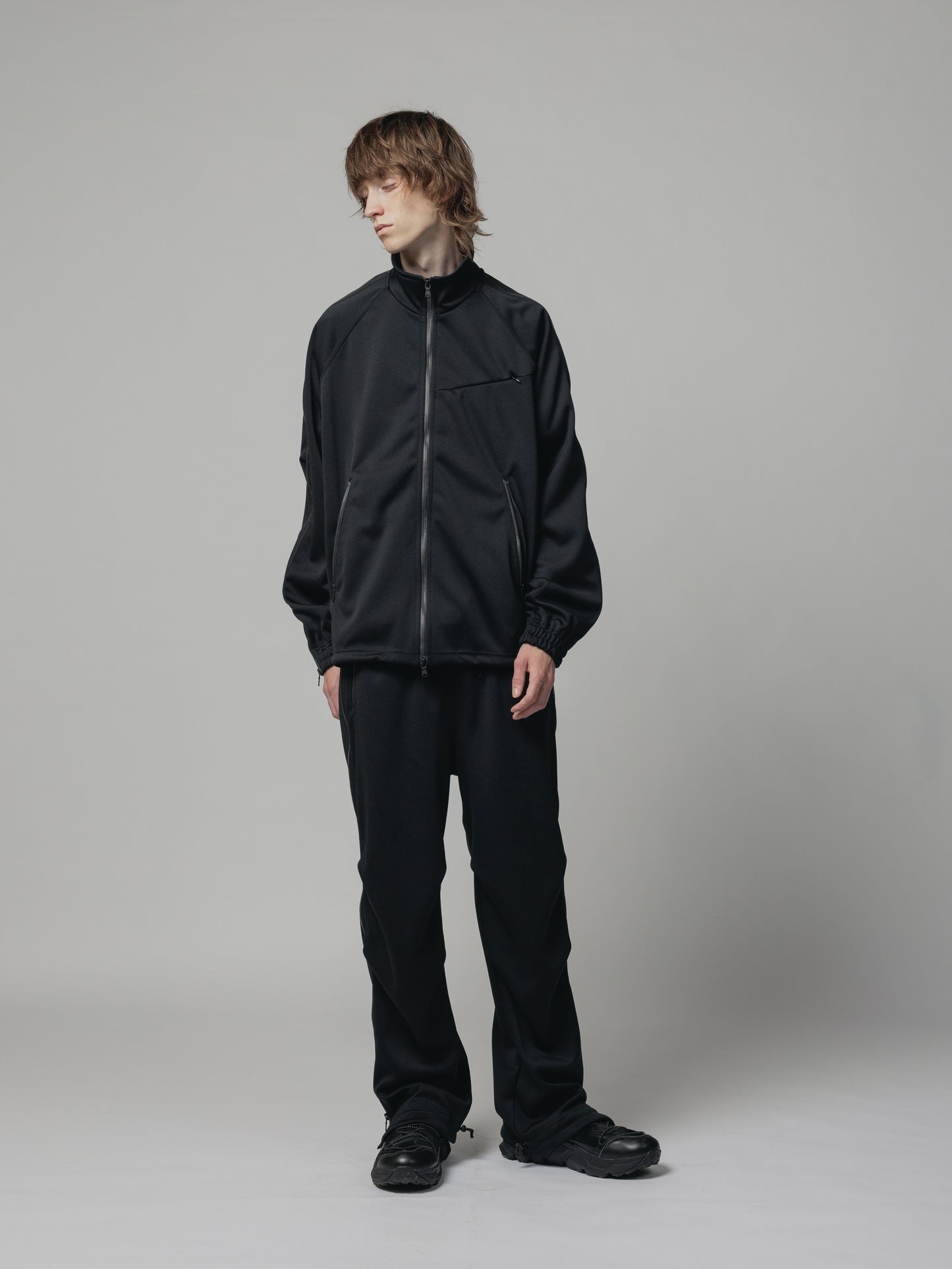 
                  
                    EXCLUSIVE TRACK PANTS
                  
                