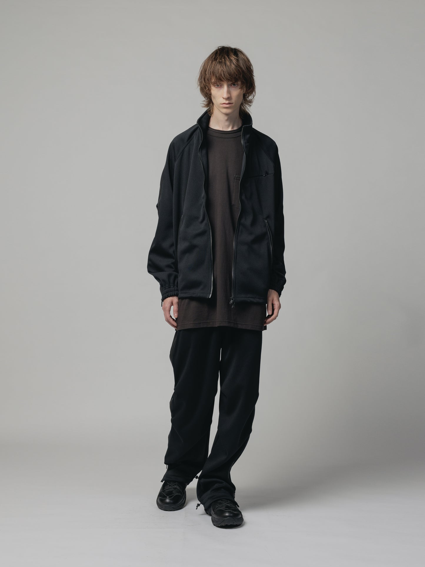 
                  
                    EXCLUSIVE TRACK PANTS
                  
                