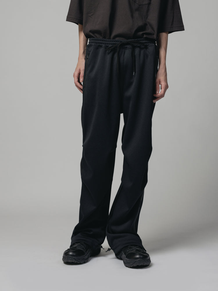 
                  
                    EXCLUSIVE TRACK PANTS
                  
                