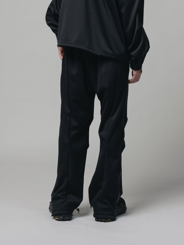 
                  
                    EXCLUSIVE TRACK PANTS
                  
                