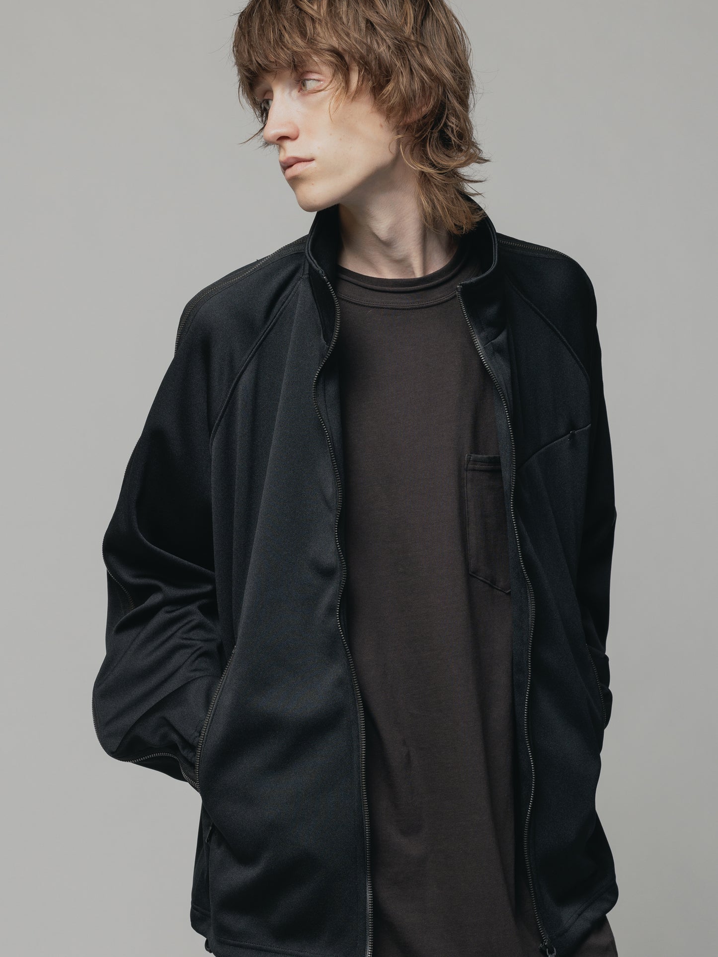 
                  
                    EXCLUSIVE TRACK JACKET
                  
                