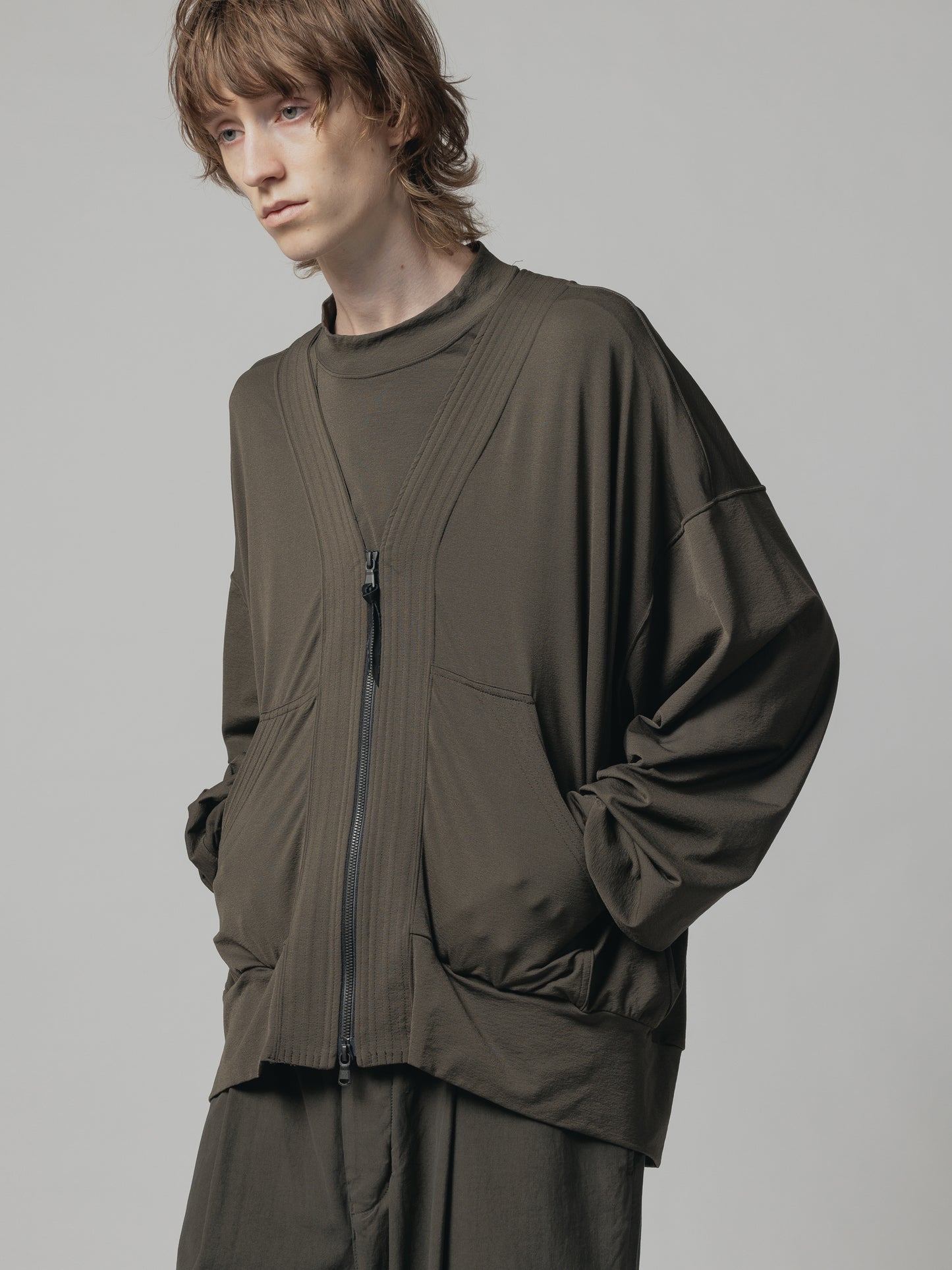 
                  
                    NYLON SMOOTH ZIP-UP CARDIGAN
                  
                