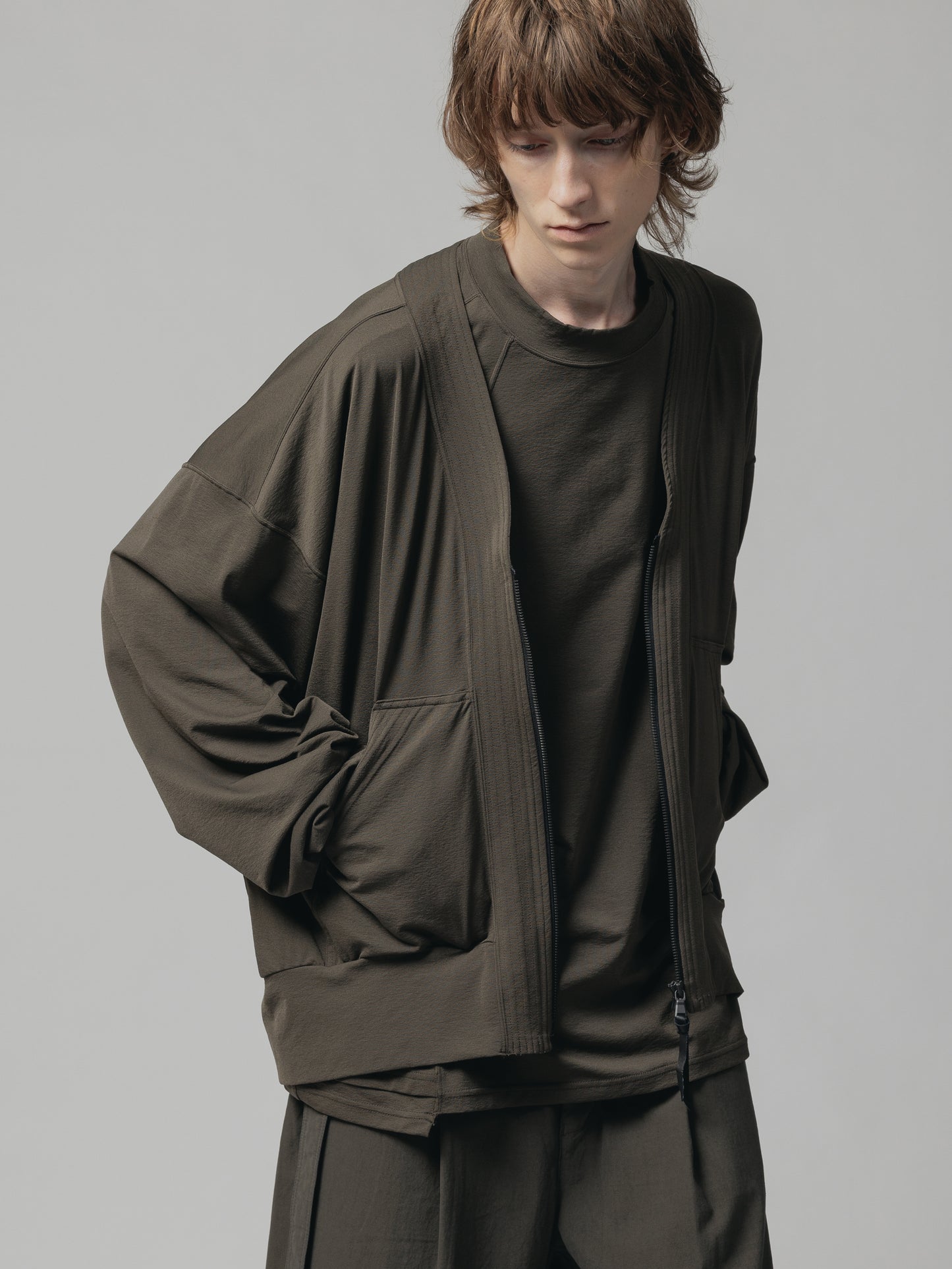 
                  
                    NYLON SMOOTH ZIP-UP CARDIGAN
                  
                