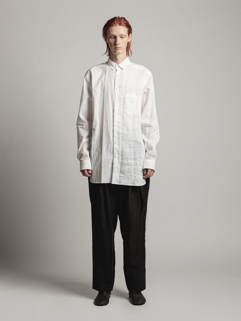 
                  
                    ODD-FABRIC SHIRT
                  
                