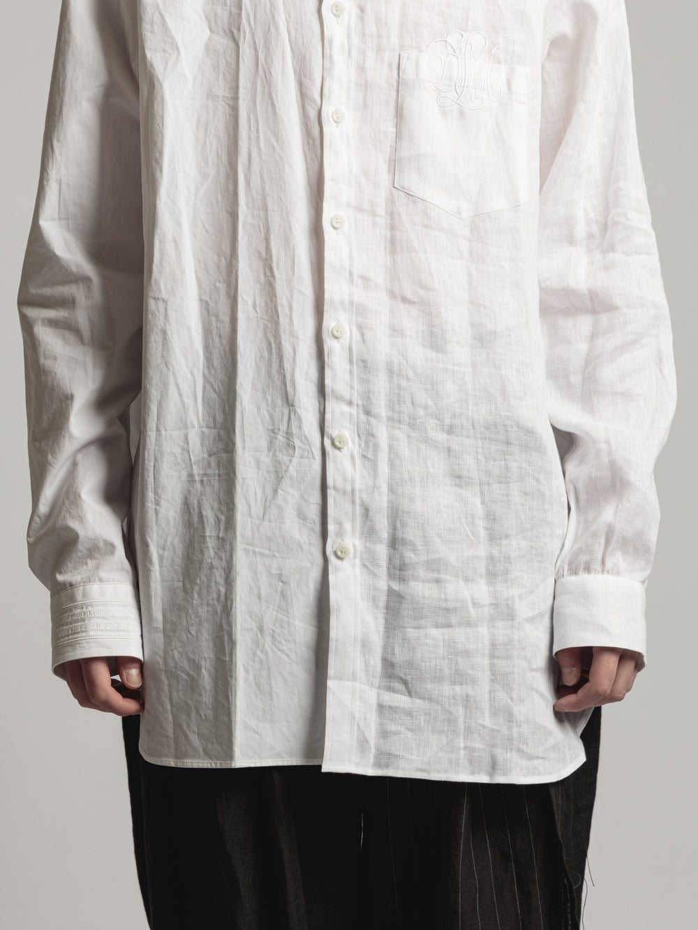 
                  
                    ODD-FABRIC SHIRT
                  
                