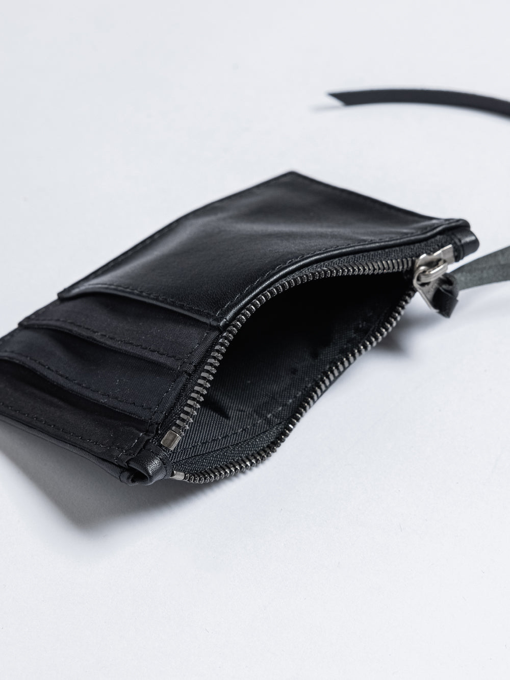 
                  
                    LEATHER CARD CASE
                  
                