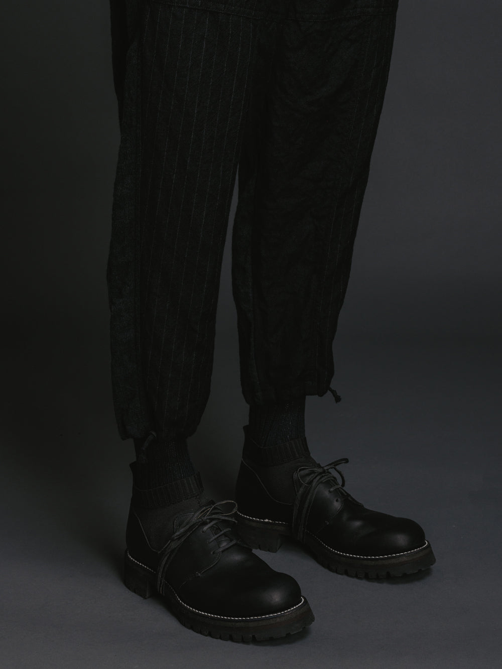 
                  
                    STRIPED COMBINATION TROUSERS
                  
                